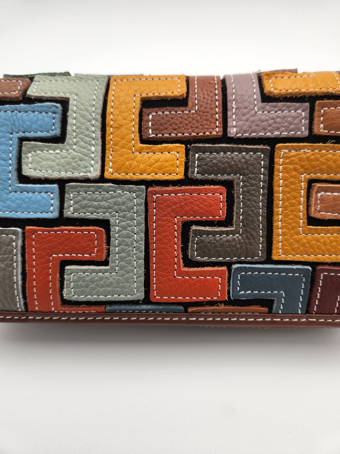 Intricate leather patchwork wallet