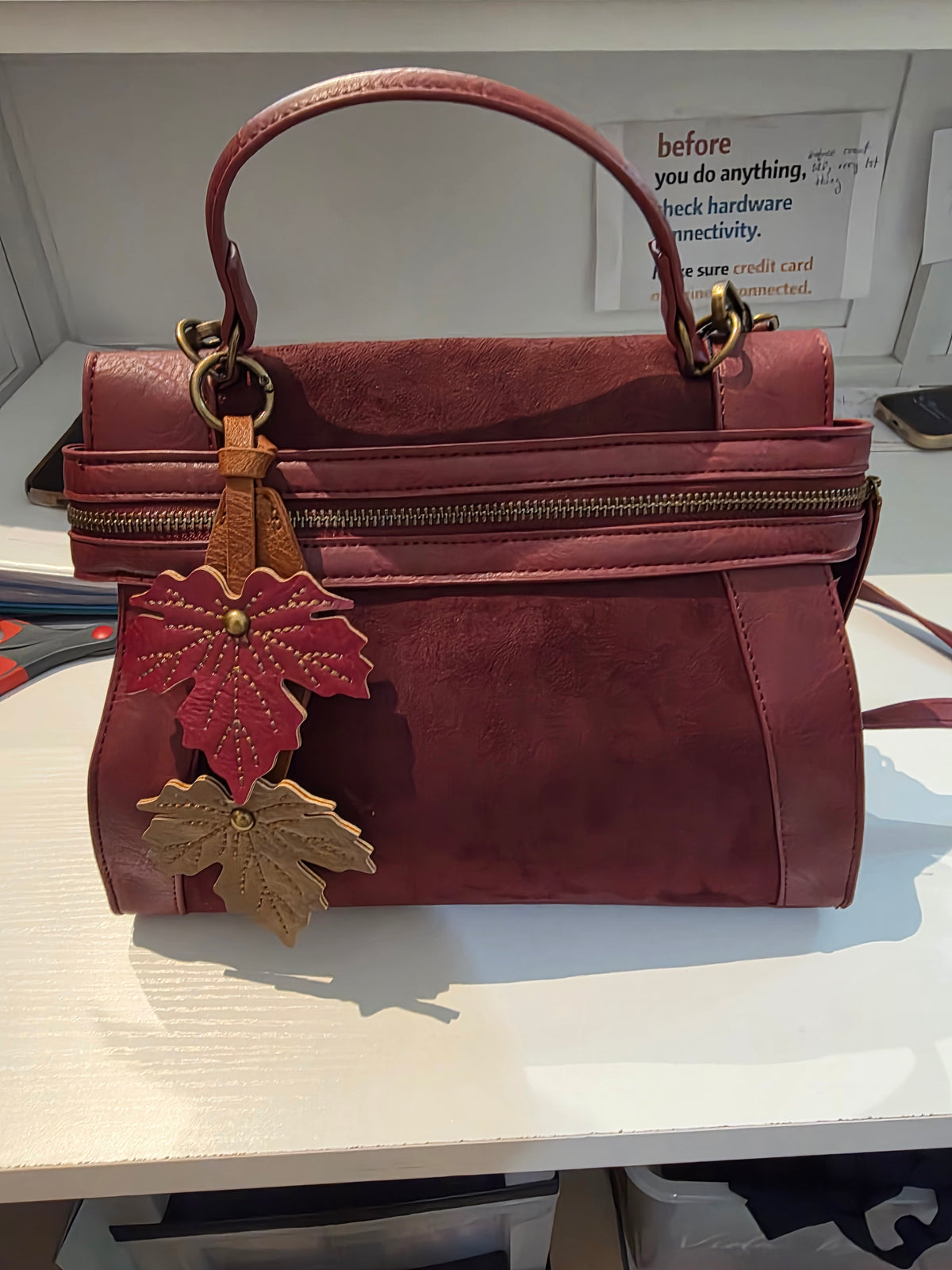 Covertabke backpack. Burgandy/black/brown
