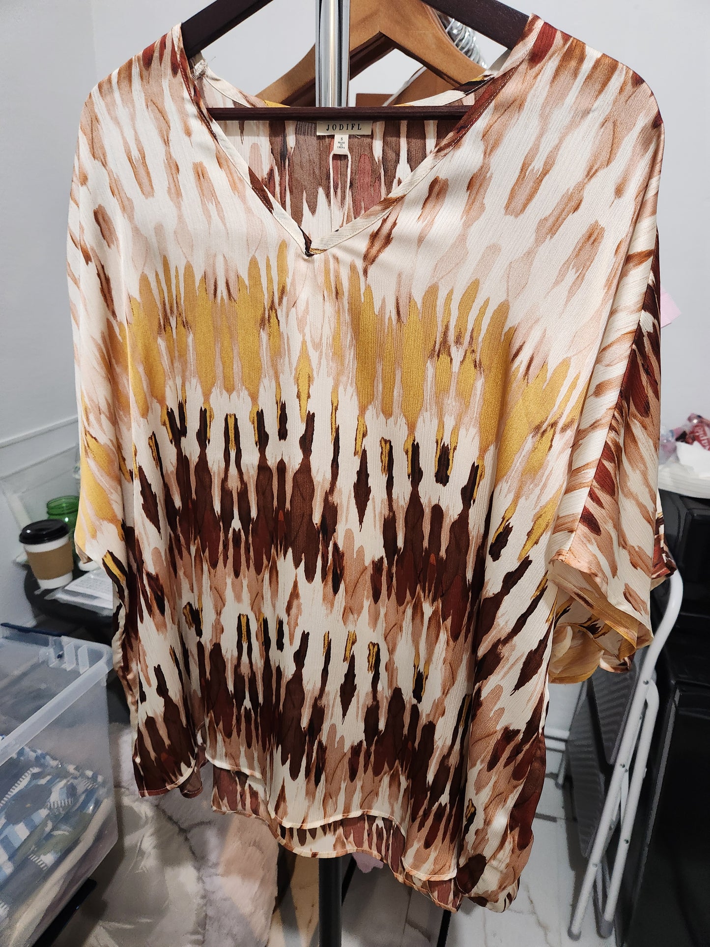 Watershed in brown blouse