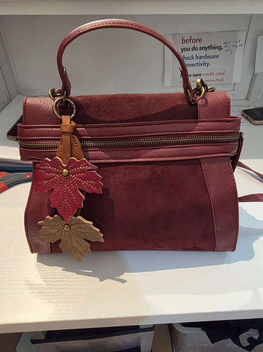 Covertabke backpack. Burgandy/black/brown